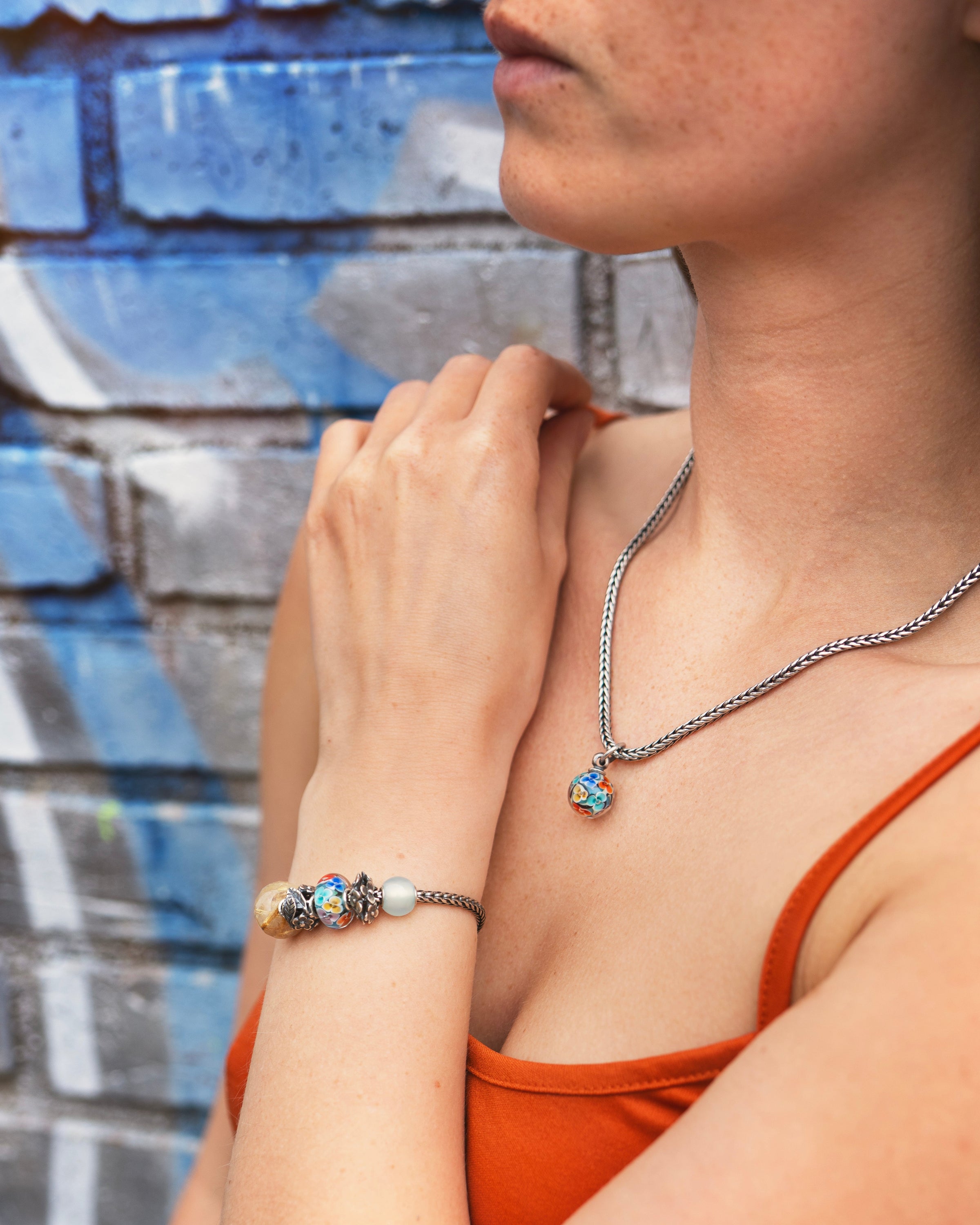Daydream Blossom bead and tassel on sterling silver necklace and sterling silver bracelet with complementing beads